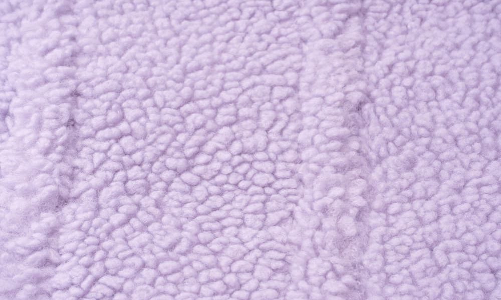 Por que investir no tecido pelúcia carapinha?